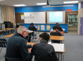  An eighth grade math classes at Covert Public Schools. The district has many low-income, minority students and has outperformed many districts in the state like it. 