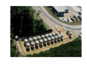 Palisades stores nuclear waste in these dry casks on the plant site, close to Lake Michigan. 