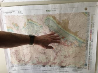 Tim Brown pointing out GFG Resource’s work area out in the Rattlesnake Hills
