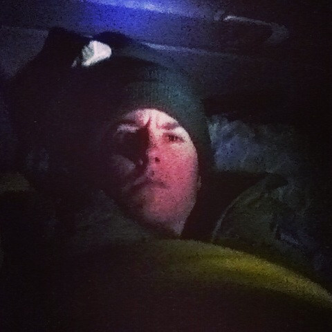 Getting ready to go to sleep in the back seat of my Honda Civic during gale-force winds in North Dakota.