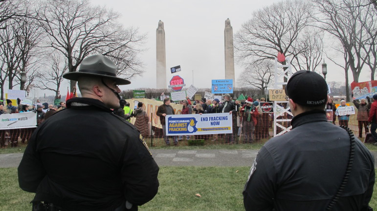 Police monitoring an anti-fracking protest during Gov. Tom Wolf’s January 2015 inauguration at the state capitol in Harrisburg, Pennsylvania.