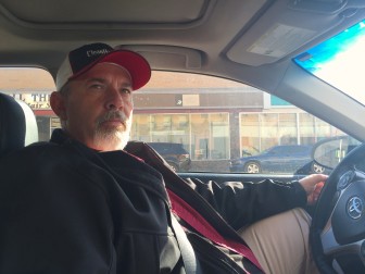 Oil worker Shane Bookout in his car in downtown Williston, North Dakota.