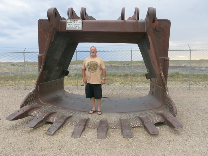 Miner Kent Parrish stands in a coal shovel at a roadside viewing platform for the Eagle Butte coal mine outside of Gillette, Wyoming.