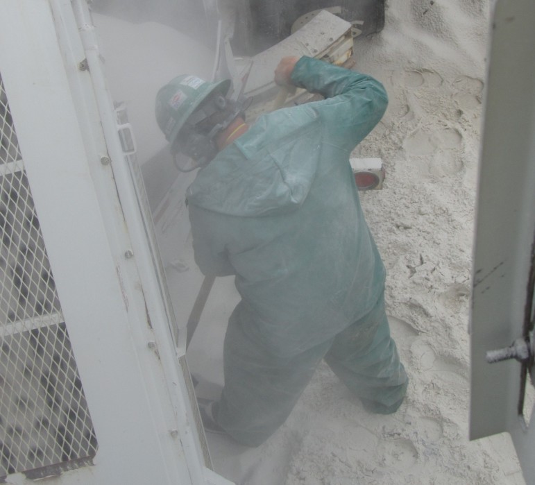 A worker observed by researchers from the National Institute for Occupational Safety and Health during exposure to silica dust on the job in this undated handout photo. 