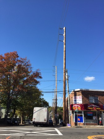 Port Washington, Long Island's new power lines are the tallest things on the block. Some hope a microgrid will prevent the need for new lines like these in thee future. 