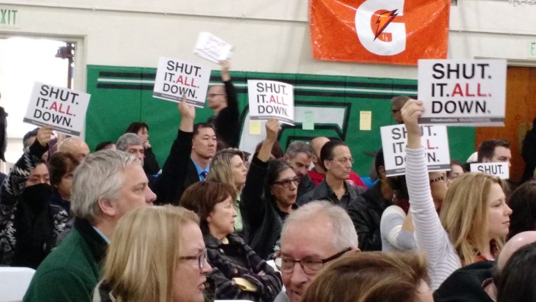 Signs like these asking for the complete closure of the Aliso Canyon Gas Storage facility, which Southern California Gas considers an essential asset, are beginning to appear at rallies held by residents of Porter Ranch.