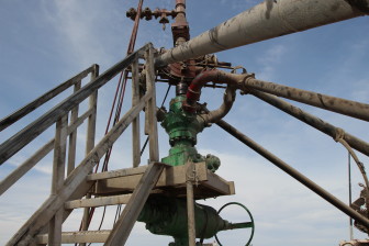 A wellhead near Stanton, Texas. The rig count in the Permian Basin has fallen by 50 per cent since April 2014. But production is rising.