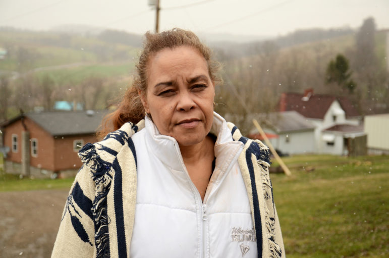 Jeannie Moten lives down the street from the Eakins. She has no running water at her home, and receives drinking- water donations, as do several of her neighbors.