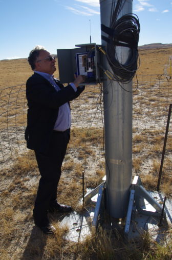 Viridis Eolia CEO Juan Carlos Carpio checks the wind speed at the company's project site in the Shirley Basin of Wyoming. 